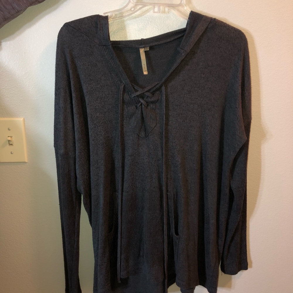 Lace up sweater with a hood